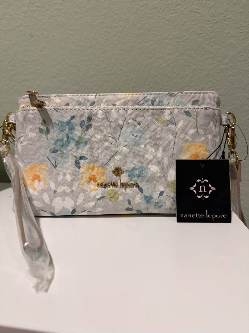 Nanette Lepore Pastel Floral Wristlet Clutch in Yellow, Blue, White